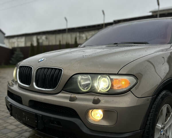 Коричневый БМВ Х5, объемом двигателя 3 л и пробегом 318 тыс. км за 9850 $, фото 5 на Automoto.ua