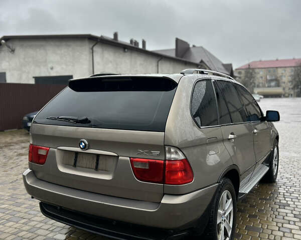 Коричневый БМВ Х5, объемом двигателя 3 л и пробегом 318 тыс. км за 9850 $, фото 12 на Automoto.ua