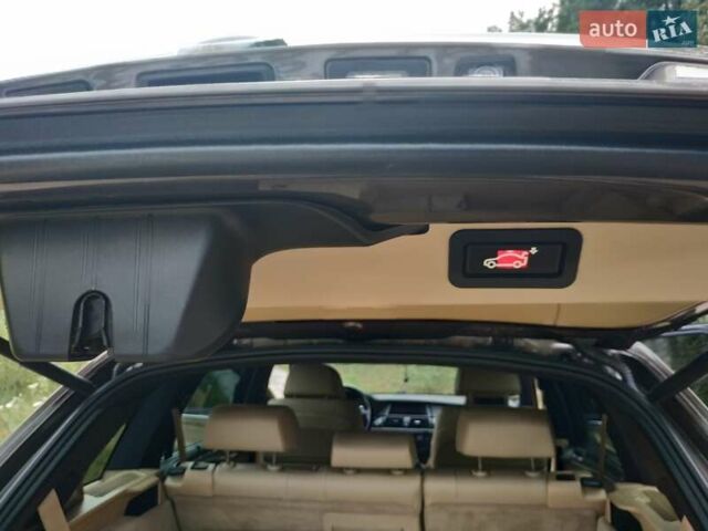 Коричневый БМВ Х5, объемом двигателя 2.98 л и пробегом 120 тыс. км за 16000 $, фото 6 на Automoto.ua