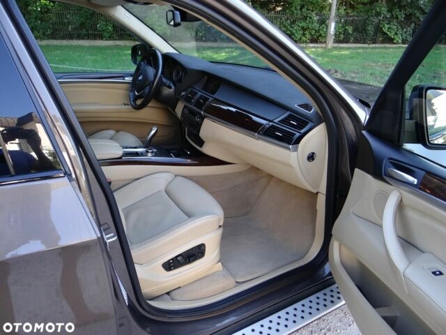 Коричневий БМВ Х5, об'ємом двигуна 3 л та пробігом 133 тис. км за 9400 $, фото 4 на Automoto.ua