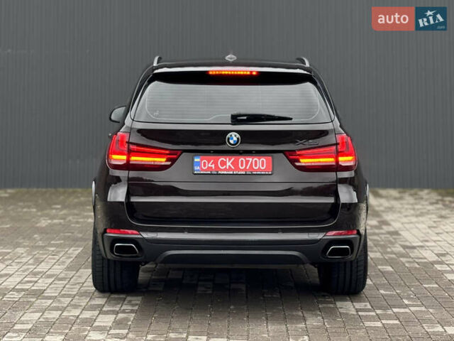 Коричневый БМВ Х5, объемом двигателя 3 л и пробегом 259 тыс. км за 33333 $, фото 10 на Automoto.ua