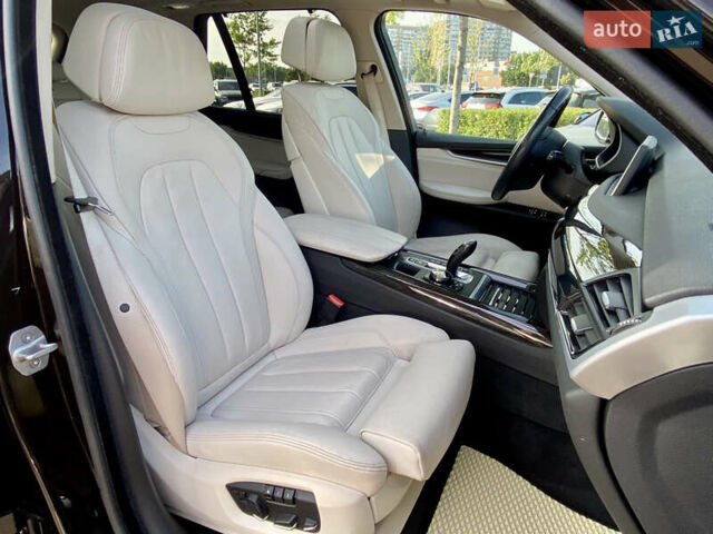 Коричневий БМВ Х5, об'ємом двигуна 4.4 л та пробігом 70 тис. км за 28100 $, фото 16 на Automoto.ua