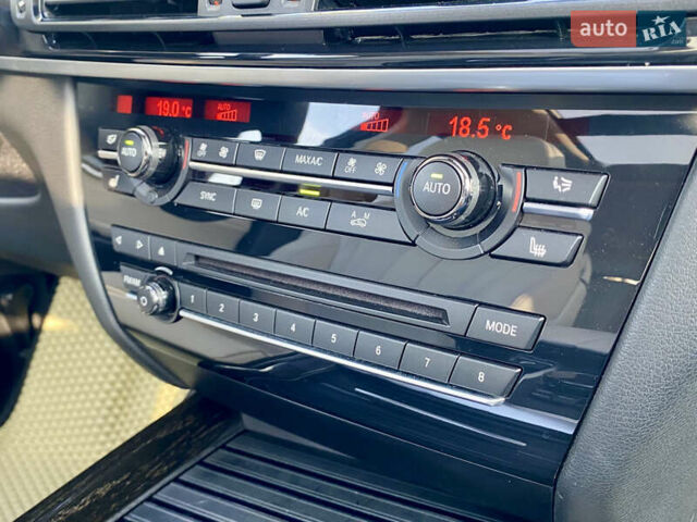 Коричневий БМВ Х5, об'ємом двигуна 4.4 л та пробігом 70 тис. км за 28100 $, фото 14 на Automoto.ua