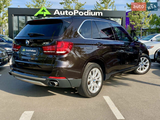 Коричневий БМВ Х5, об'ємом двигуна 4.4 л та пробігом 70 тис. км за 28100 $, фото 3 на Automoto.ua