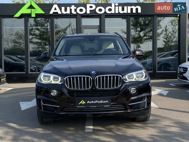 Коричневий БМВ Х5, об'ємом двигуна 4.4 л та пробігом 70 тис. км за 28100 $, фото 1 на Automoto.ua