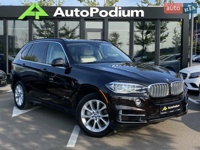 Коричневий БМВ Х5, об'ємом двигуна 4.4 л та пробігом 70 тис. км за 28100 $, фото 2 на Automoto.ua