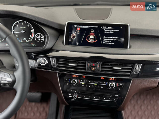 Коричневый БМВ Х5, объемом двигателя 3 л и пробегом 259 тыс. км за 33333 $, фото 32 на Automoto.ua