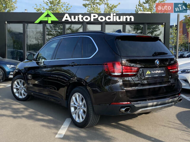Коричневий БМВ Х5, об'ємом двигуна 4.4 л та пробігом 70 тис. км за 28100 $, фото 5 на Automoto.ua