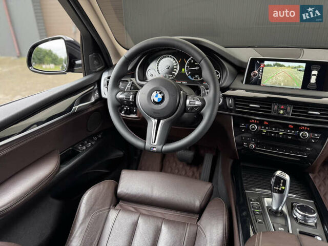 Коричневый БМВ Х5, объемом двигателя 3 л и пробегом 259 тыс. км за 33333 $, фото 27 на Automoto.ua