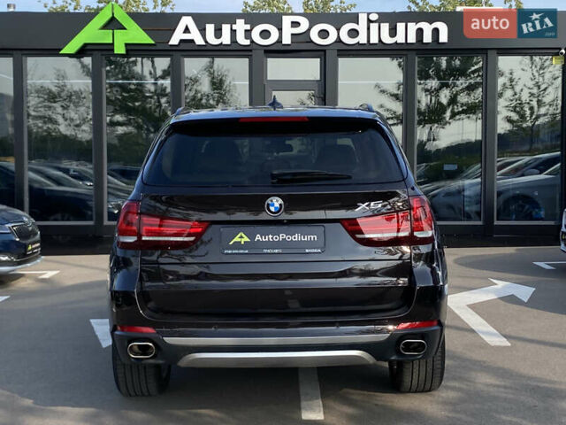 Коричневий БМВ Х5, об'ємом двигуна 4.4 л та пробігом 70 тис. км за 28100 $, фото 4 на Automoto.ua