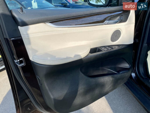 Коричневий БМВ Х5, об'ємом двигуна 4.4 л та пробігом 70 тис. км за 28100 $, фото 6 на Automoto.ua