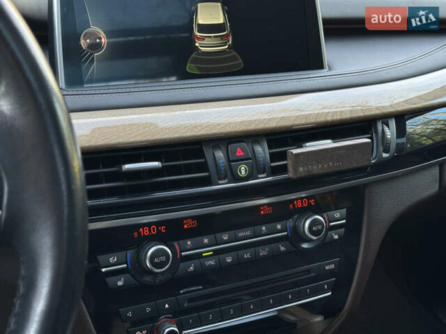 Коричневый БМВ Х5, объемом двигателя 2 л и пробегом 179 тыс. км за 28900 $, фото 55 на Automoto.ua