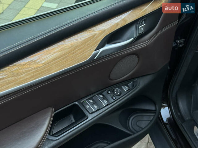 Коричневый БМВ Х5, объемом двигателя 2 л и пробегом 179 тыс. км за 28900 $, фото 44 на Automoto.ua