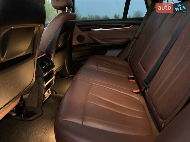 Коричневый БМВ Х5, объемом двигателя 2 л и пробегом 218 тыс. км за 23900 $, фото 78 на Automoto.ua
