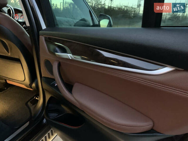 Коричневый БМВ Х5, объемом двигателя 2 л и пробегом 218 тыс. км за 23900 $, фото 88 на Automoto.ua