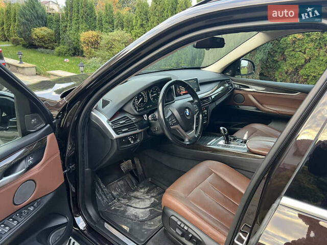 Коричневий БМВ Х5, об'ємом двигуна 2.99 л та пробігом 209 тис. км за 30900 $, фото 4 на Automoto.ua