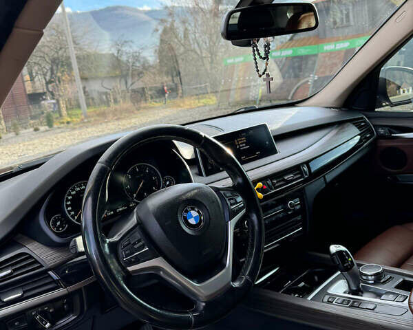 Коричневый БМВ Х5, объемом двигателя 2.99 л и пробегом 258 тыс. км за 26000 $, фото 12 на Automoto.ua