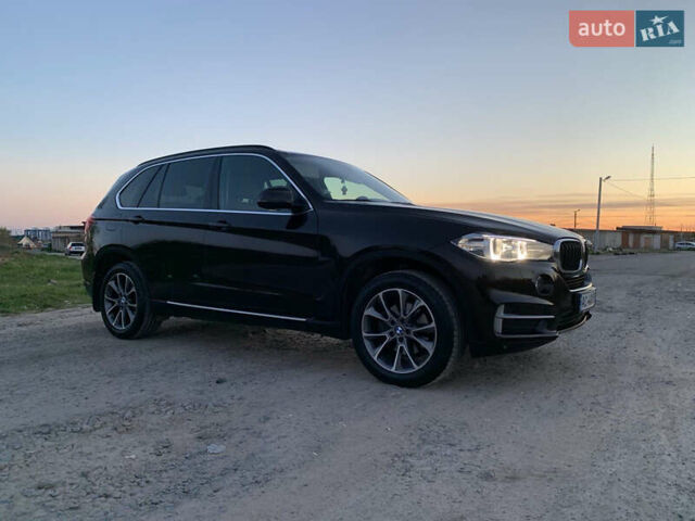 Коричневый БМВ Х5, объемом двигателя 2 л и пробегом 218 тыс. км за 23900 $, фото 12 на Automoto.ua