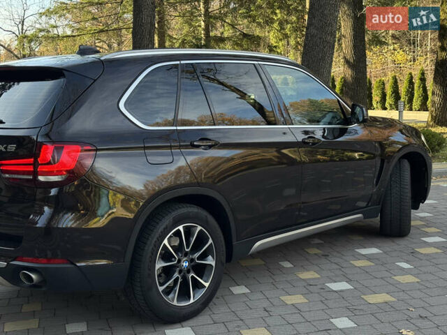 Коричневый БМВ Х5, объемом двигателя 2 л и пробегом 179 тыс. км за 28900 $, фото 25 на Automoto.ua