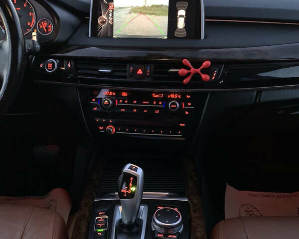 Коричневый БМВ Х5, объемом двигателя 2 л и пробегом 218 тыс. км за 23900 $, фото 73 на Automoto.ua