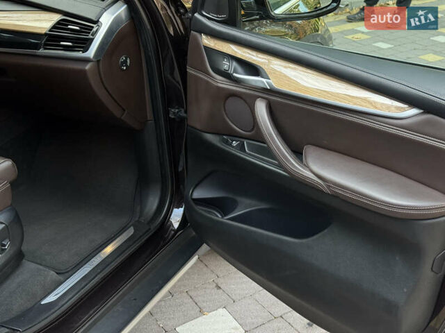Коричневый БМВ Х5, объемом двигателя 2 л и пробегом 179 тыс. км за 28900 $, фото 86 на Automoto.ua