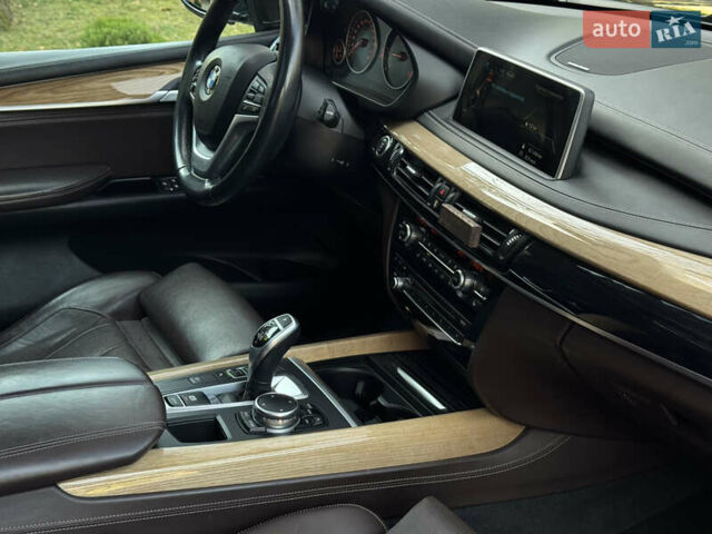 Коричневый БМВ Х5, объемом двигателя 2 л и пробегом 179 тыс. км за 28900 $, фото 88 на Automoto.ua