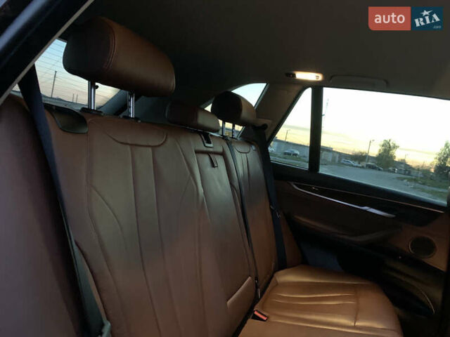 Коричневый БМВ Х5, объемом двигателя 2 л и пробегом 218 тыс. км за 23900 $, фото 90 на Automoto.ua
