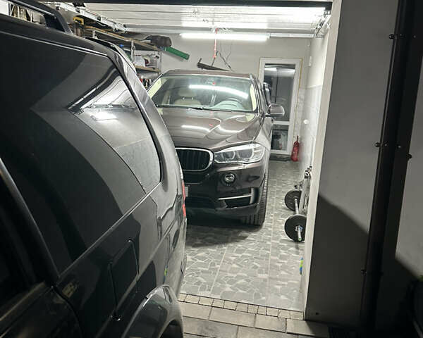 Коричневый БМВ Х5, объемом двигателя 2 л и пробегом 170 тыс. км за 26500 $, фото 18 на Automoto.ua