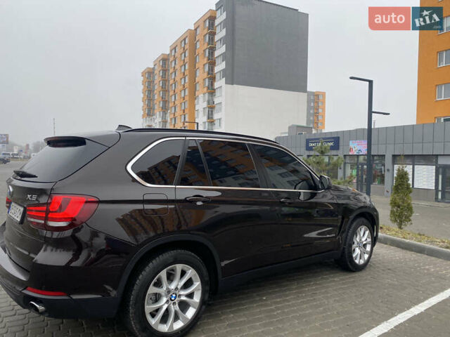 Коричневий БМВ Х5, об'ємом двигуна 3 л та пробігом 119 тис. км за 33000 $, фото 4 на Automoto.ua