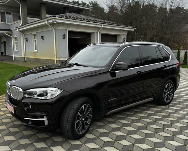 Коричневый БМВ Х5, объемом двигателя 2.99 л и пробегом 261 тыс. км за 27700 $, фото 4 на Automoto.ua