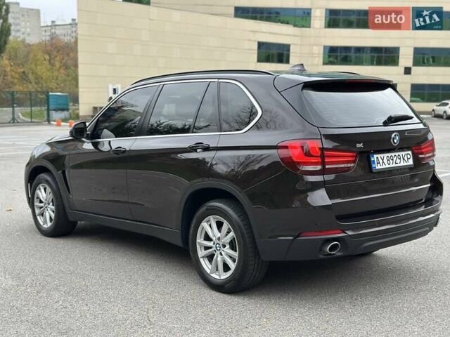 Коричневый БМВ Х5, объемом двигателя 2 л и пробегом 180 тыс. км за 22900 $, фото 3 на Automoto.ua