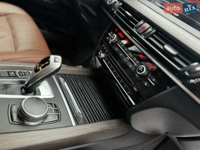 Коричневый БМВ Х5, объемом двигателя 2 л и пробегом 89 тыс. км за 34950 $, фото 57 на Automoto.ua
