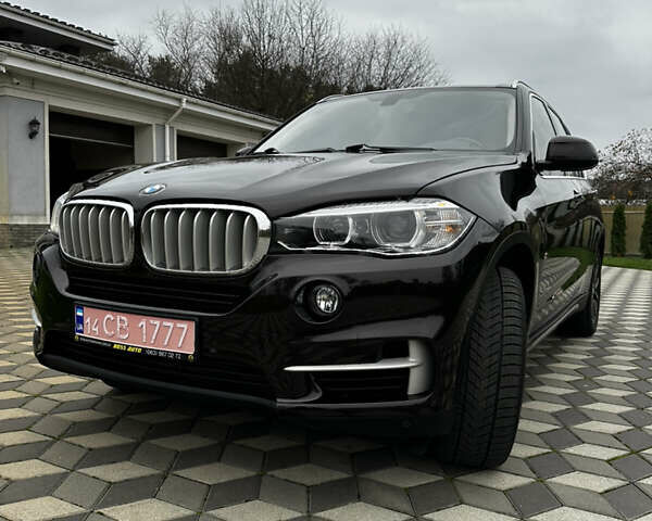 Коричневый БМВ Х5, объемом двигателя 2.99 л и пробегом 261 тыс. км за 27700 $, фото 2 на Automoto.ua