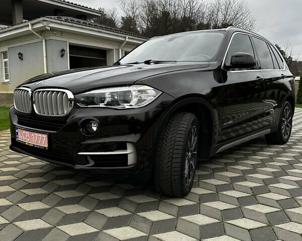 Коричневый БМВ Х5, объемом двигателя 2.99 л и пробегом 261 тыс. км за 27700 $, фото 3 на Automoto.ua