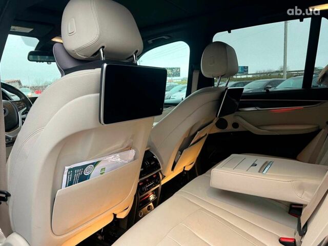 Коричневый БМВ Х5, объемом двигателя 2 л и пробегом 172 тыс. км за 34000 $, фото 37 на Automoto.ua