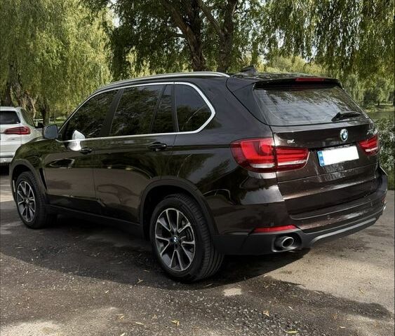 Коричневый БМВ Х5, объемом двигателя 2 л и пробегом 82 тыс. км за 34000 $, фото 2 на Automoto.ua
