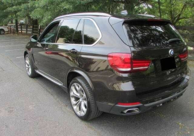 Коричневый БМВ Х5, объемом двигателя 3 л и пробегом 88 тыс. км за 30000 $, фото 3 на Automoto.ua