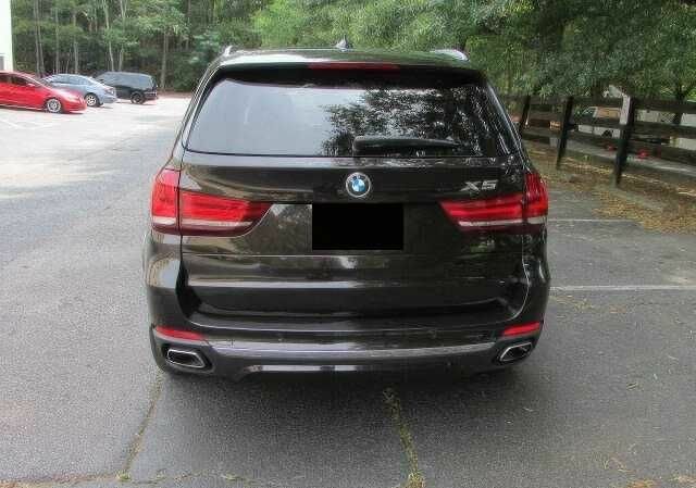 Коричневый БМВ Х5, объемом двигателя 3 л и пробегом 88 тыс. км за 30000 $, фото 4 на Automoto.ua