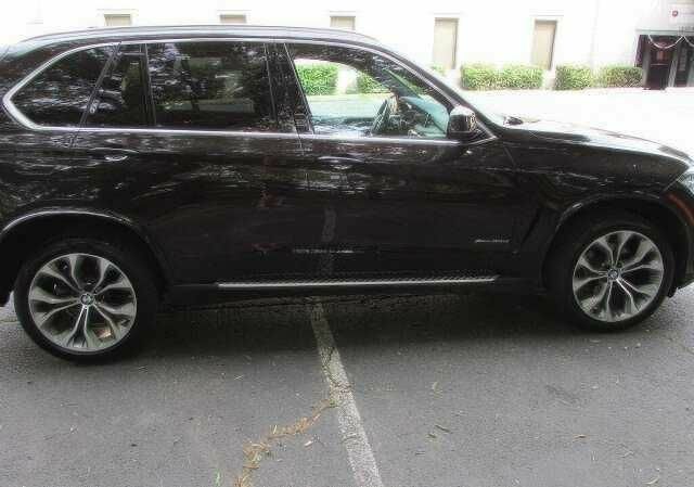 Коричневый БМВ Х5, объемом двигателя 3 л и пробегом 88 тыс. км за 30000 $, фото 6 на Automoto.ua