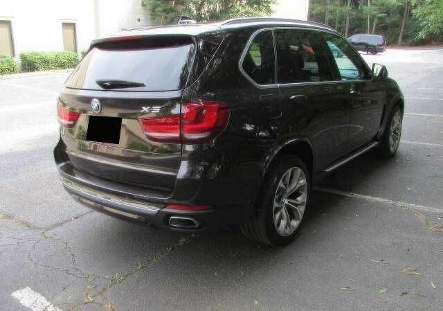 Коричневый БМВ Х5, объемом двигателя 3 л и пробегом 88 тыс. км за 30000 $, фото 5 на Automoto.ua