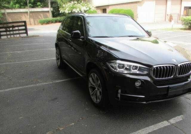 Коричневый БМВ Х5, объемом двигателя 3 л и пробегом 88 тыс. км за 30000 $, фото 1 на Automoto.ua