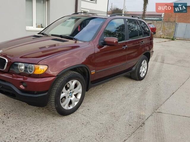 Красный БМВ Х5, объемом двигателя 2.93 л и пробегом 395 тыс. км за 7750 $, фото 5 на Automoto.ua