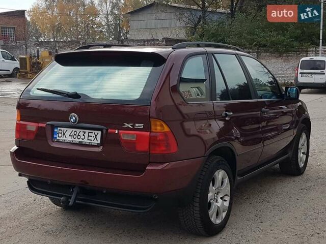 Красный БМВ Х5, объемом двигателя 2.93 л и пробегом 395 тыс. км за 7750 $, фото 14 на Automoto.ua