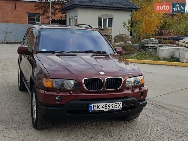 Красный БМВ Х5, объемом двигателя 2.93 л и пробегом 395 тыс. км за 7750 $, фото 2 на Automoto.ua