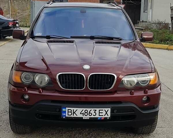 Красный БМВ Х5, объемом двигателя 2.93 л и пробегом 395 тыс. км за 7750 $, фото 1 на Automoto.ua
