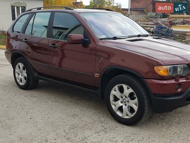 Красный БМВ Х5, объемом двигателя 2.93 л и пробегом 395 тыс. км за 7750 $, фото 20 на Automoto.ua