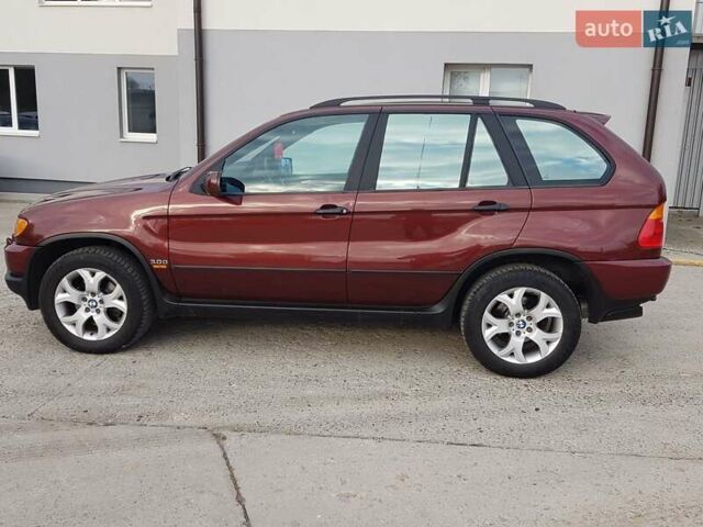 Красный БМВ Х5, объемом двигателя 2.93 л и пробегом 395 тыс. км за 7750 $, фото 9 на Automoto.ua