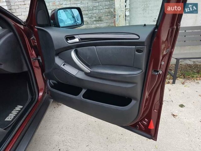 Красный БМВ Х5, объемом двигателя 2.93 л и пробегом 395 тыс. км за 7750 $, фото 45 на Automoto.ua