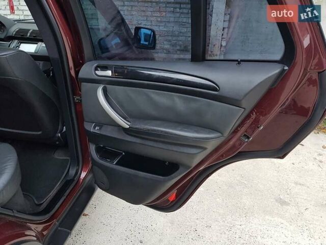 Красный БМВ Х5, объемом двигателя 2.93 л и пробегом 395 тыс. км за 7750 $, фото 43 на Automoto.ua