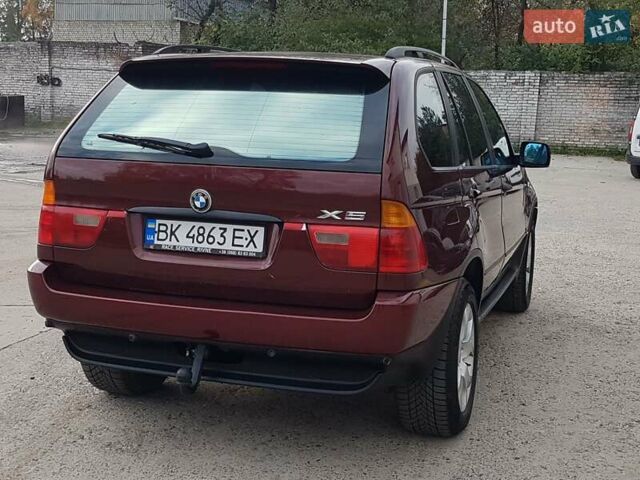Красный БМВ Х5, объемом двигателя 2.93 л и пробегом 395 тыс. км за 7750 $, фото 15 на Automoto.ua